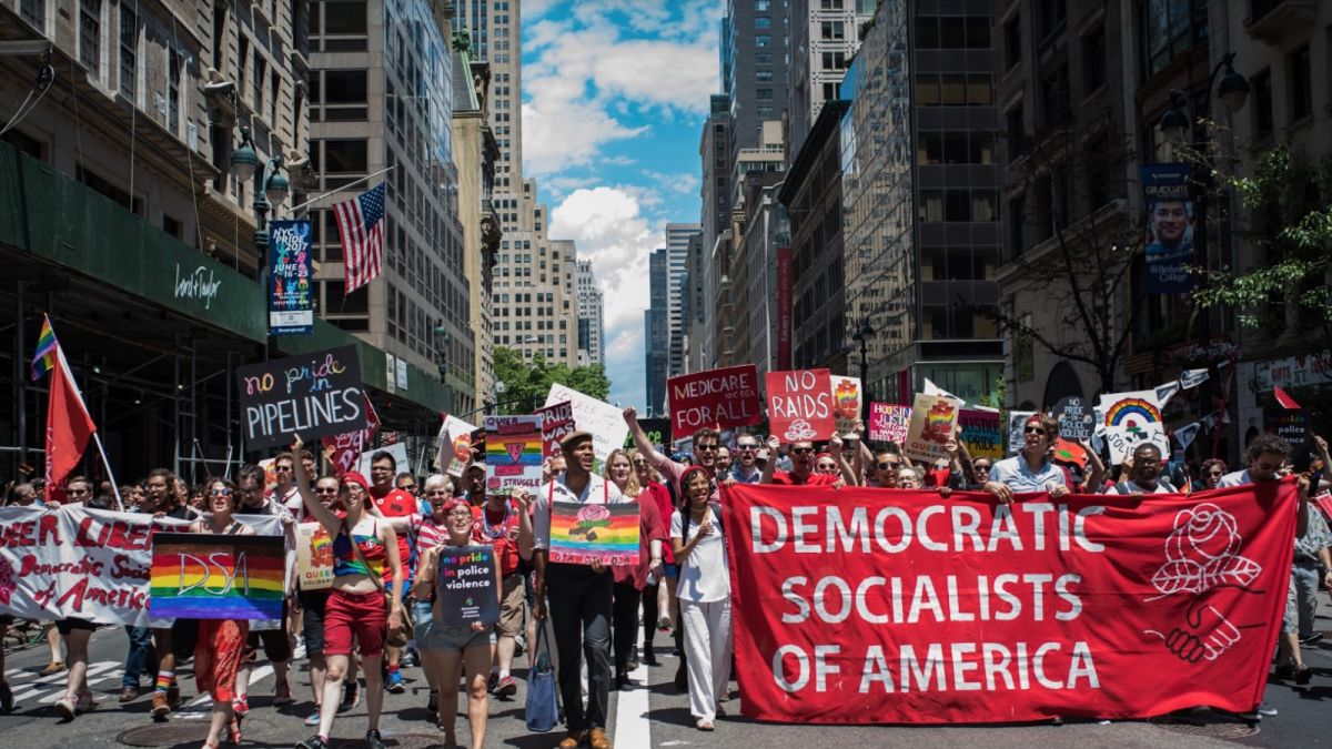 https cdn.cnn.com cnnnext dam assets 170803181630 democratic socialists of america parade